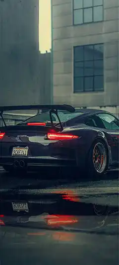 Schönes Hintergrundbild für ein modernes Telefon mit einem Auto und der Natur